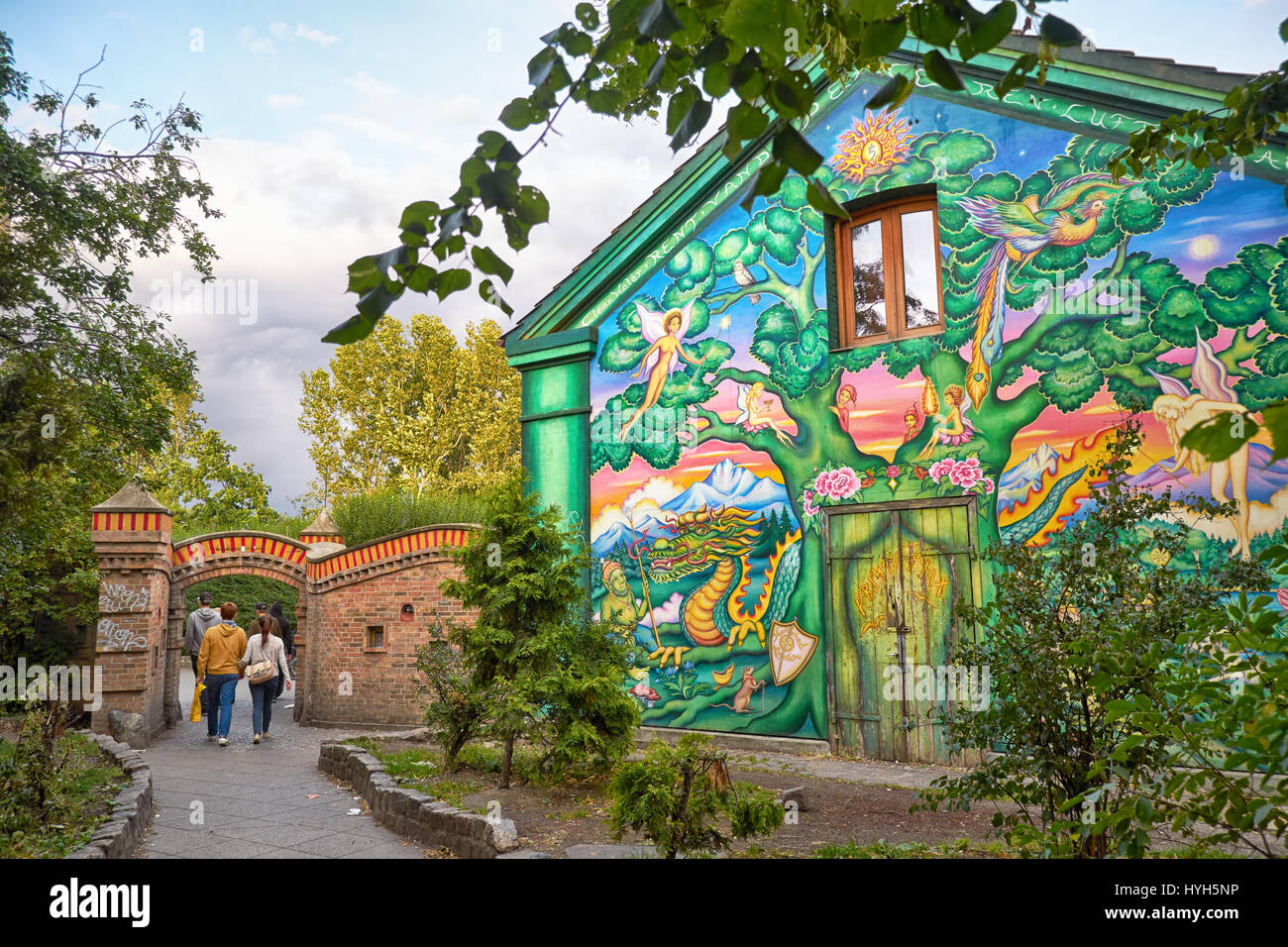 COPENHAGEN, DENMARK - AUGUST 22, 2014: The house painted by author graffiti at the entrance to Christiania in Copengagen, Denmark. Fristaden Christian Stock Photo
