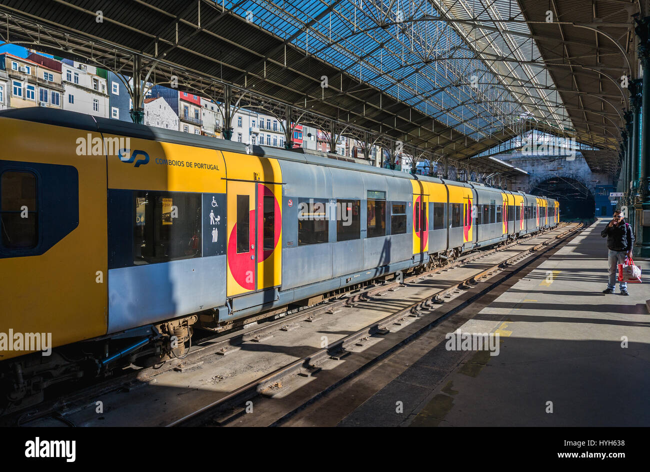 Comboios de Portugal company train on Sao Bento railway station in