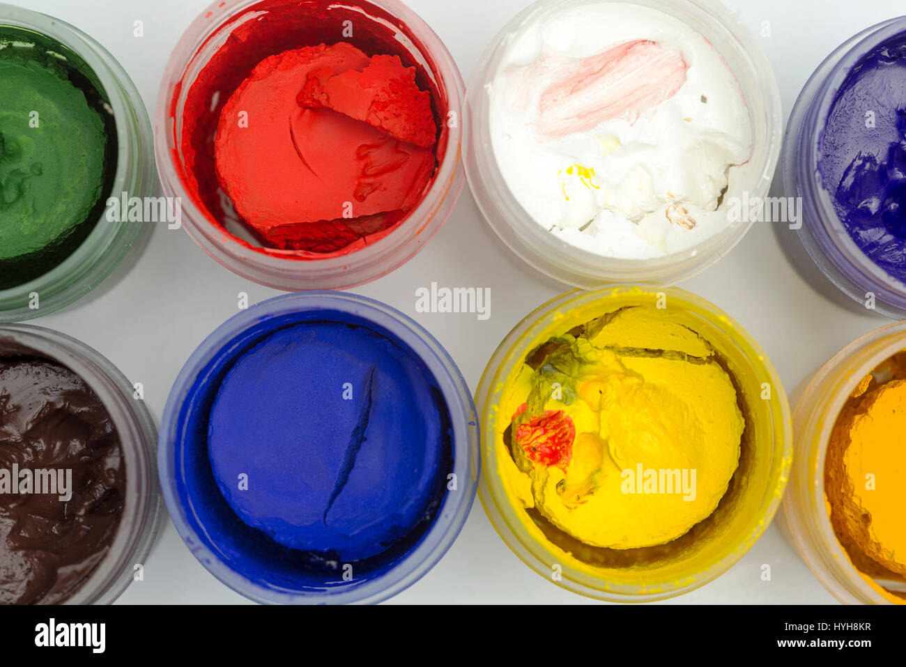 Top view of the cans of paint on a white background Stock Photo - Alamy