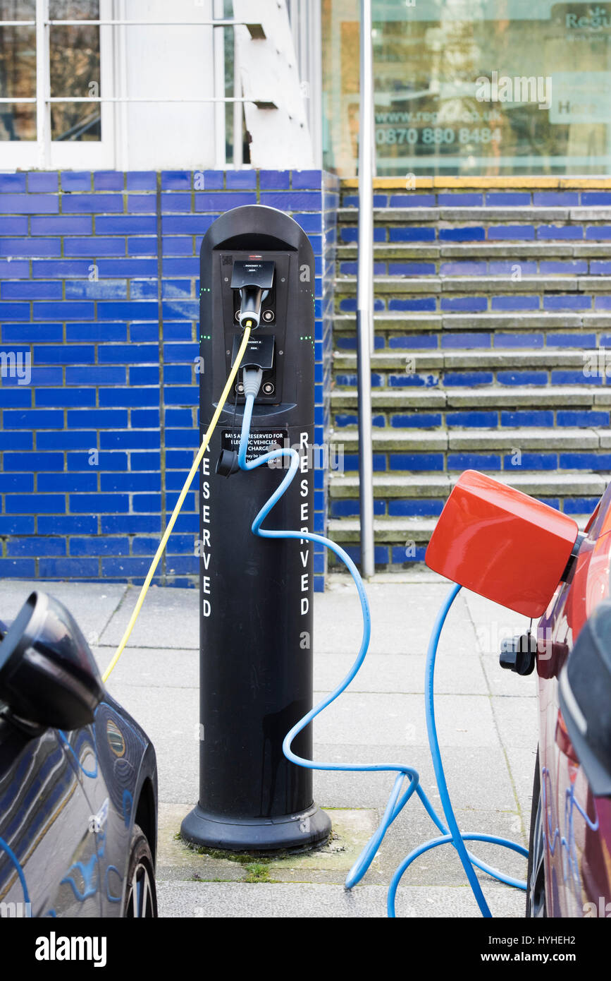 Electric car recharging batteries at a charging terminal. Milton Keynes