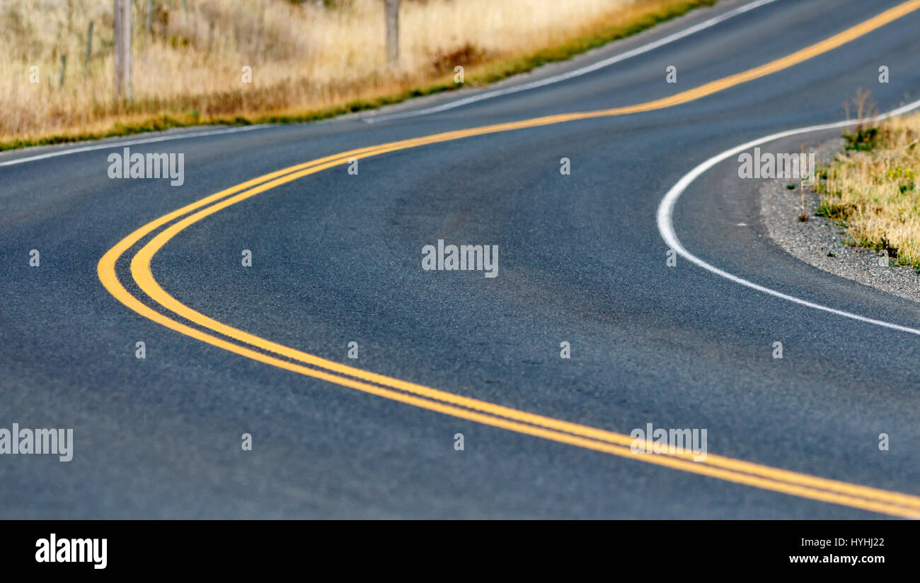 Abstract shot of a curved road. Adventure, journey Stock Photo