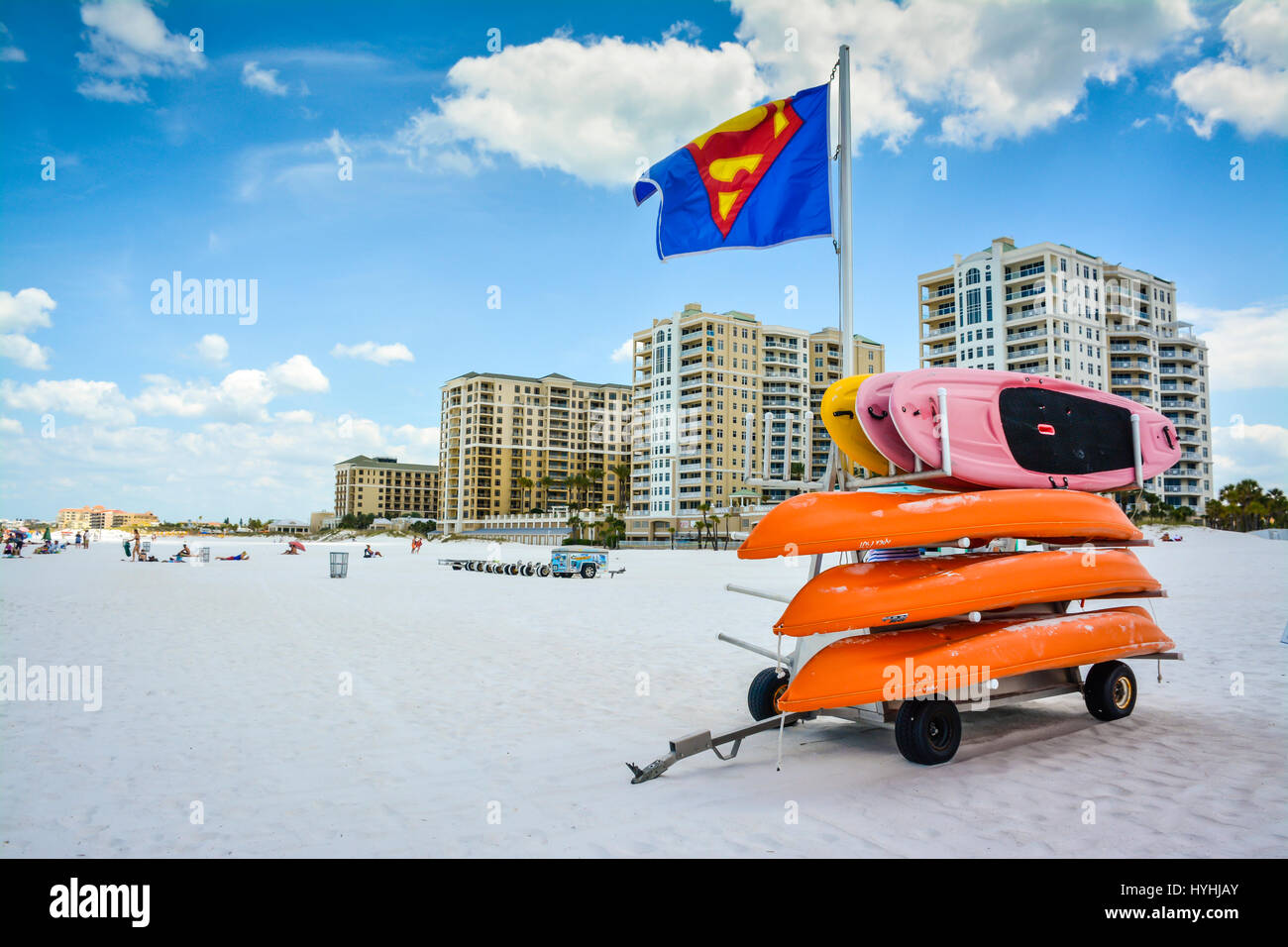 White sand beach on Clearwater Beach, Florida, with a stack of colorful