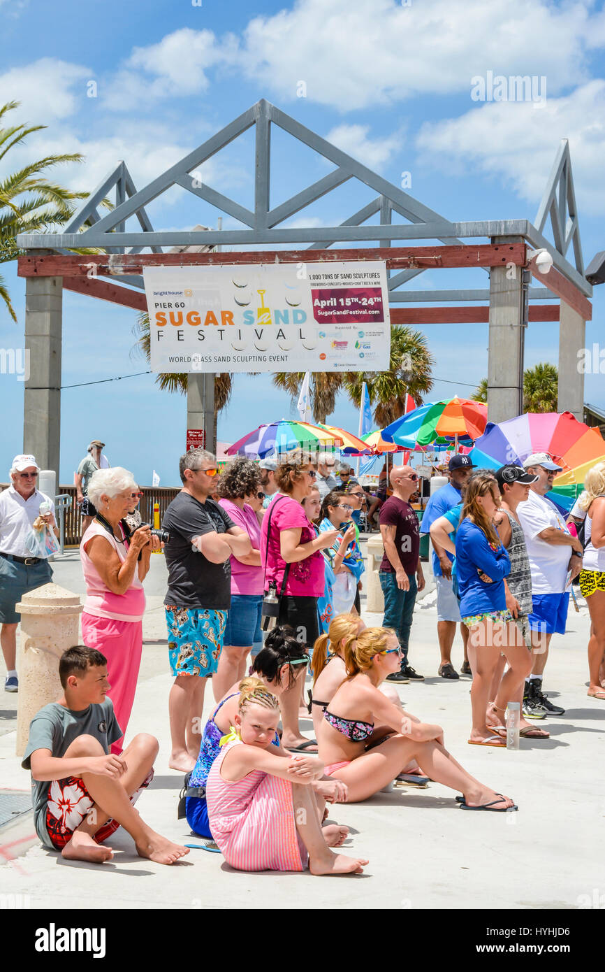 Crowds gather around the entrance to Pier 60 in Clearwater Beach, FL