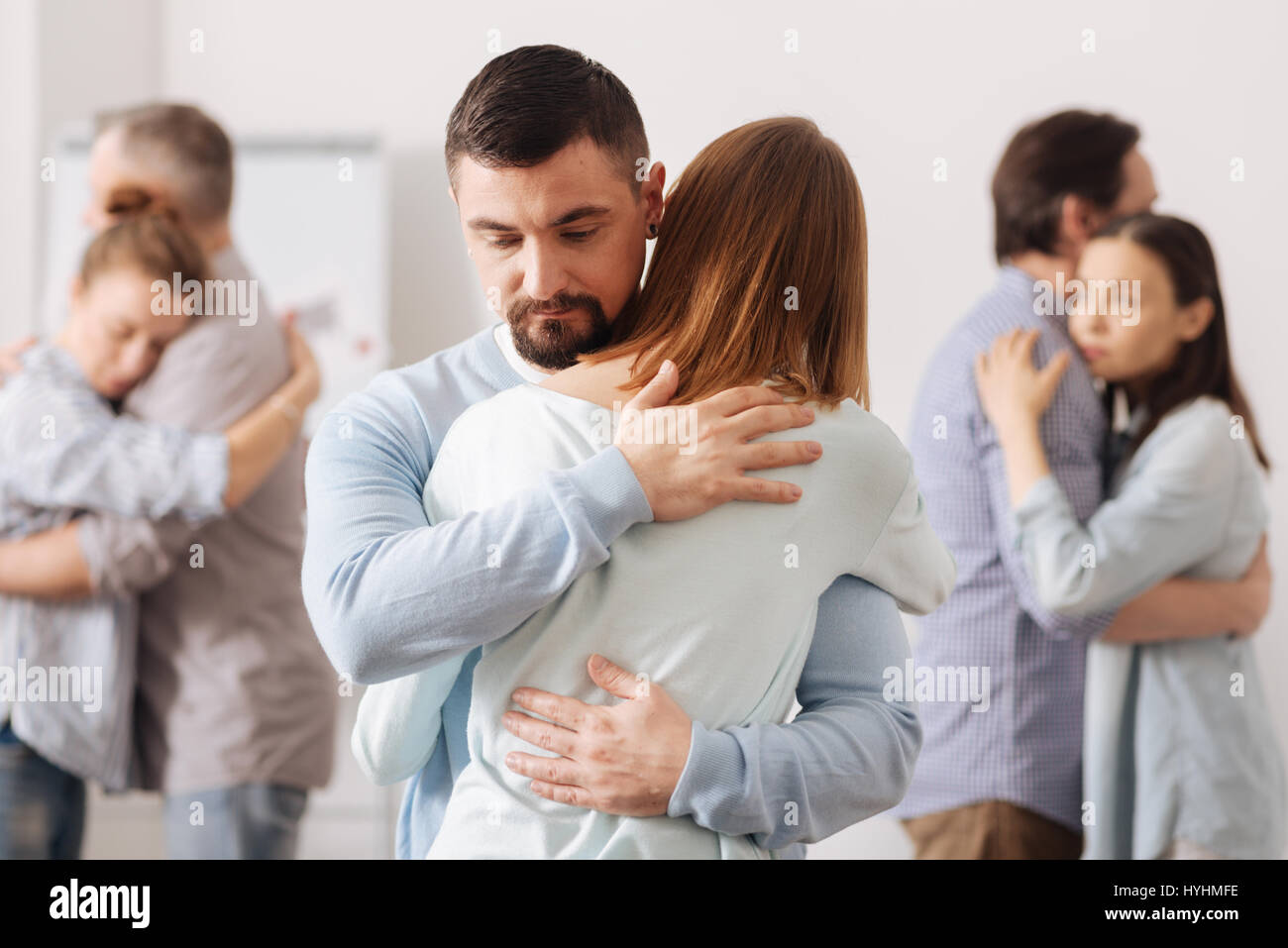 Hugging support anonymous hi-res stock photography and images - Alamy