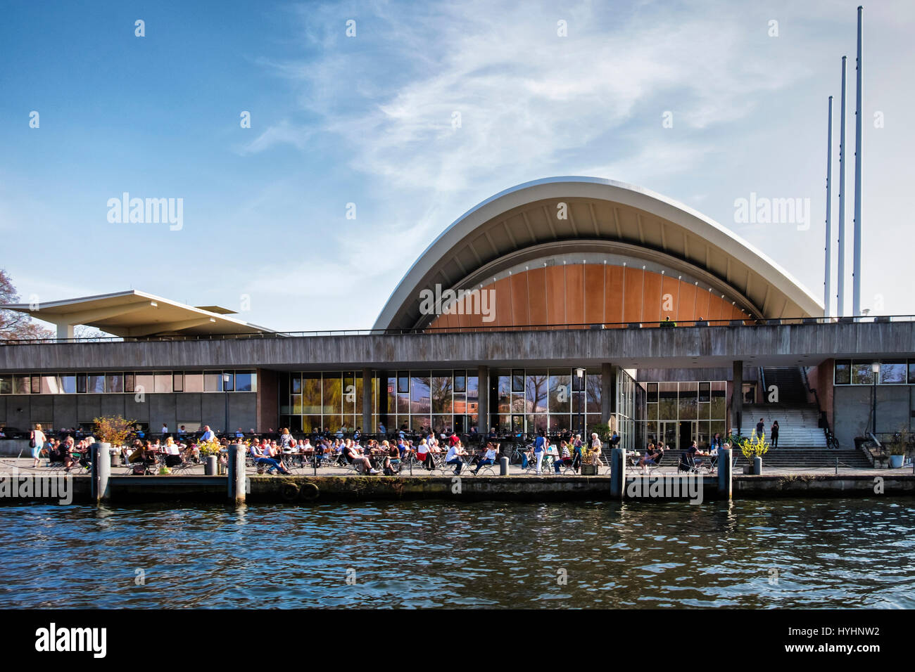 Berlin,Mitte.The HKW {Haus der Kulturen der Welt) .Cultural venue & centre for concerts, conferences & exhibitions. People at outdoor cafe Stock Photo