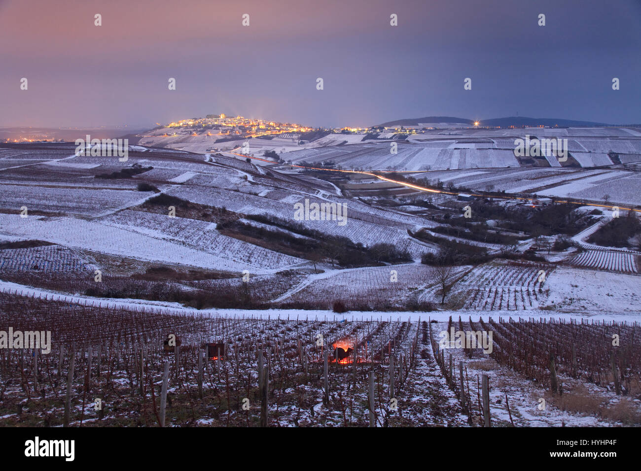 France, Cher, region of Sancerre, Chavignol and the village of Sancerre off at night, the vineyards of Sancerre in winter, burning of branches vine Stock Photo