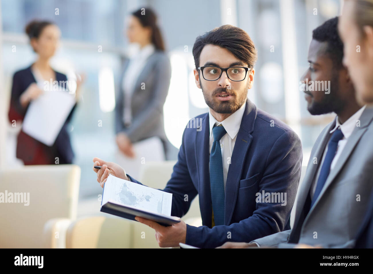 Talking to colleagues Stock Photo