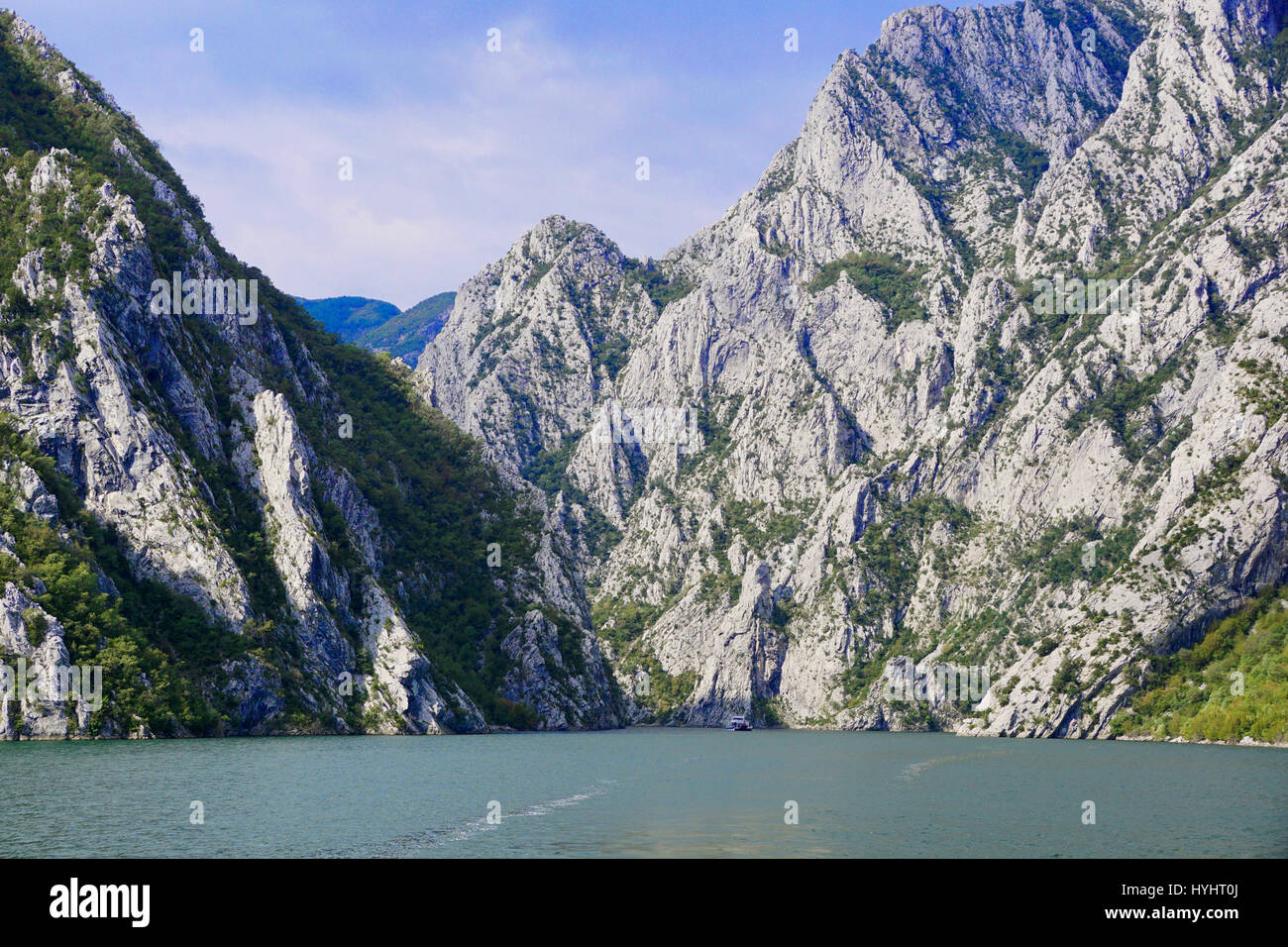 Lake Koman, rugged fjord-like mountain scenery, in Albania. Stock Photo