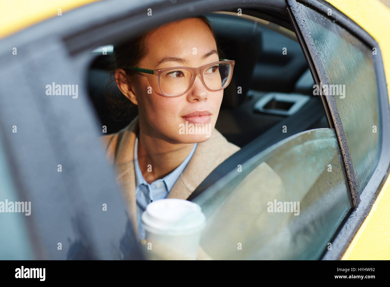 Beautiful Asian Businesswoman In Taxi Stock Photo