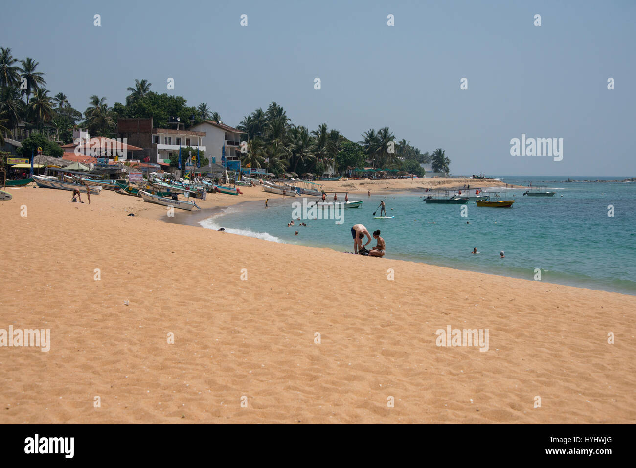 Sri Lanka, near Galle, coastal town of Unawatuna. Calamander Unawatuna Beach, major tourist attraction and top five beaches in Sri Lanka. Stock Photo