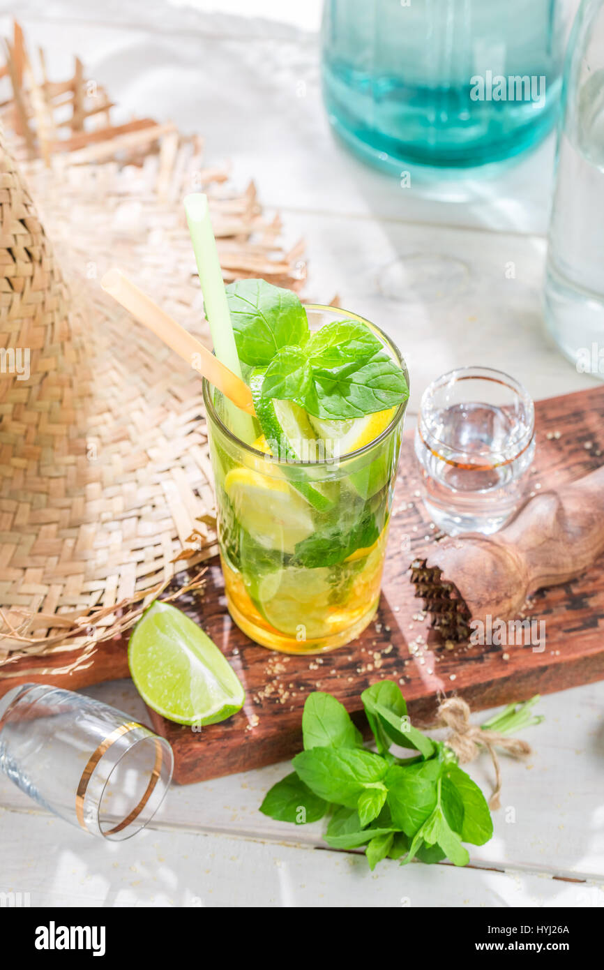 Sweet and fresh mohito with fruits and mint Stock Photo