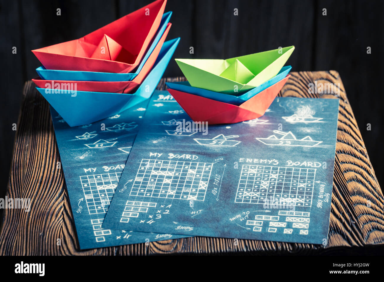 Children's battleship paper game with red and blue ships Stock Photo