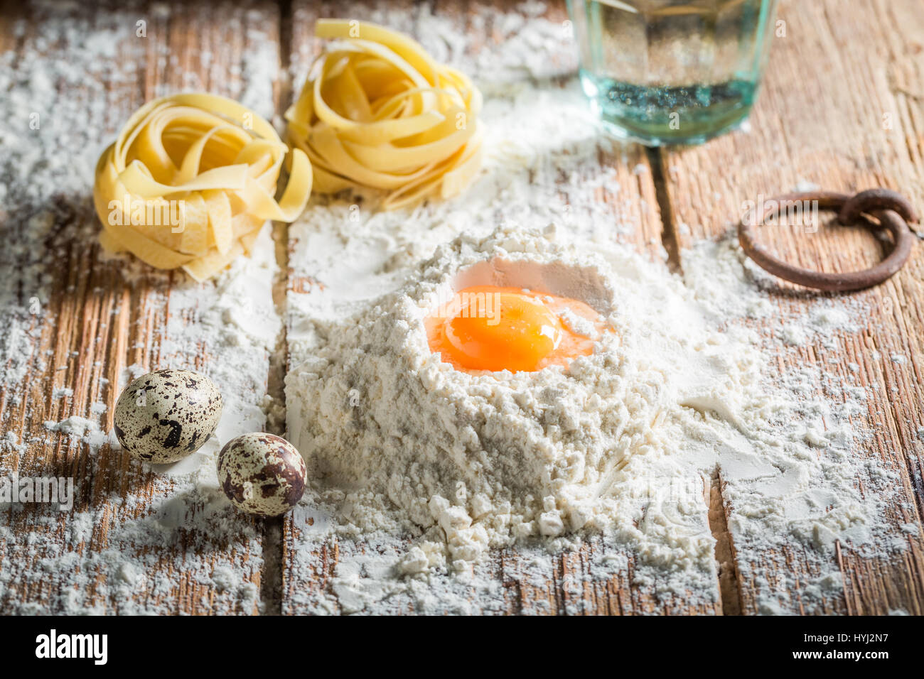 Curated visual reference: No Yeast Pasta Dough With Flour And Eggs Only Reference: Fresh Ingredients For Pasta With Flour And Eggs Stock Photo