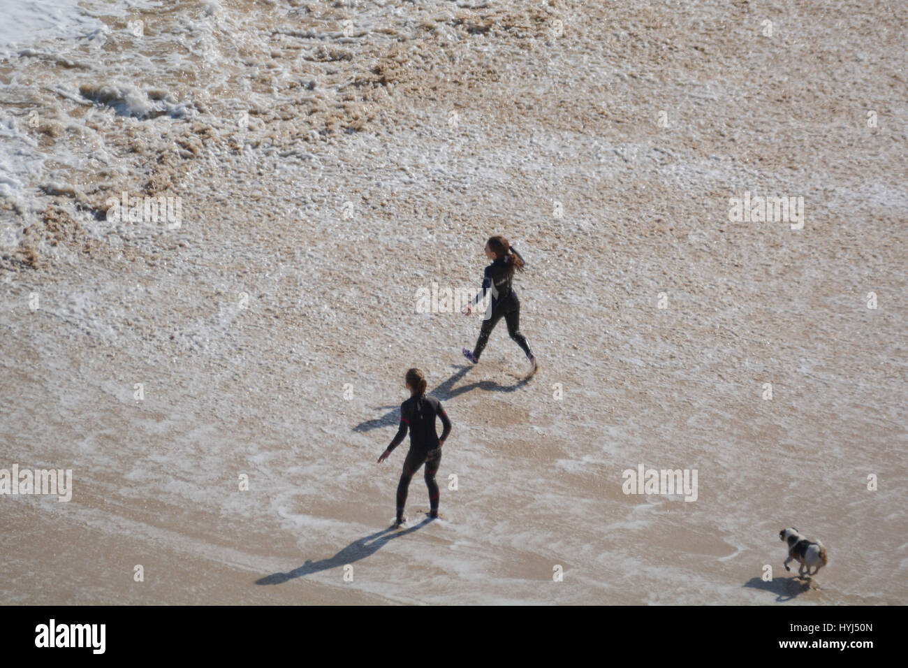 Treen, Cornwall, UK. 4th April 2017. UK Weather. After a dull morning for Easter holidaymakers, the sunshine came out on the turquoise seas and golden sands at Treen and Porthcurno Credit: cwallpix/Alamy Live News Stock Photo