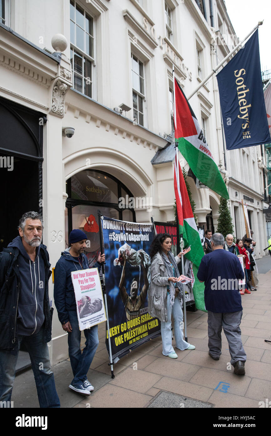 London, UK. 4th April, 2017. Campaigners from Innovative Minds protest outside Sotheby's in Bond Street to highlight supposed links between Sotheby's and the Steinmetz Diamonds Group and, through them, to the Steinmetz Foundation and the Givati Brigade of the Israeli military, which has been accused of war crimes by the UN Human Rights Council. Credit: Mark Kerrison/Alamy Live News Stock Photo