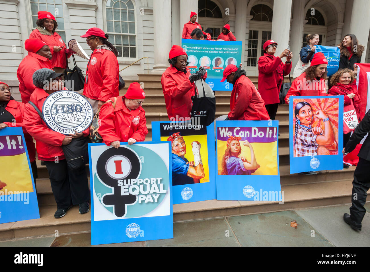 New York, USA. 4th April, 2017. New York, USA. 04th Apr, 2017. Activists, community leaders and politicians gather on the steps of City Hall in New York on Tuesday, April 4, 2017 to rally against pay disparity on the 11th annual Equal Pay Day. Nationwide the gender wage gap is averaged at 20 percent. Legislation set to be voted on tomorrow by the NY City Council would prohibit employers from asking for the wage history of prospective employees, a practice that perpetuates wage inequality. ( © Richard B. Levine) Credit: Richard Levine/Alamy Live News Stock Photo