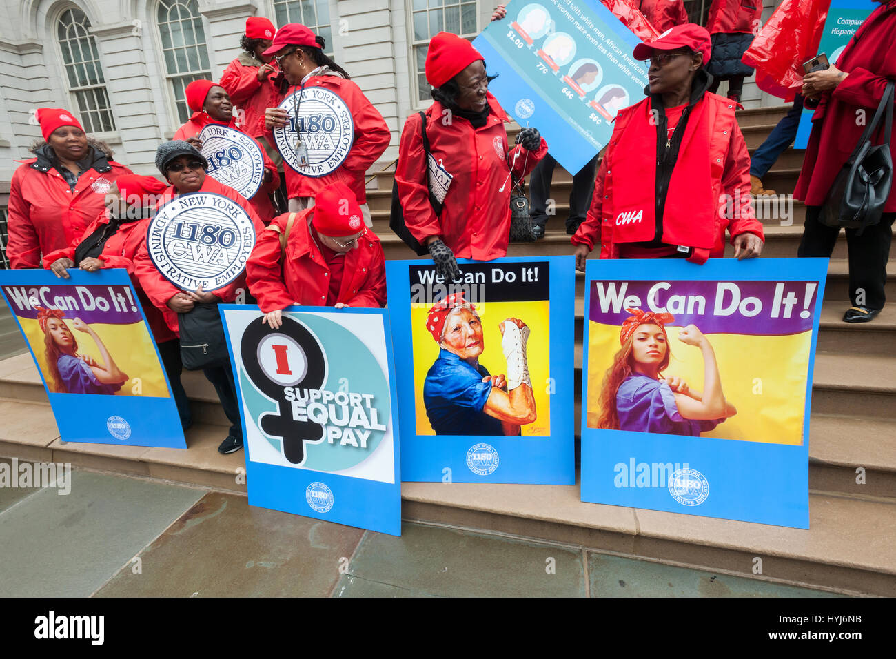 New York, USA. 4th April, 2017. New York, USA. 04th Apr, 2017. Activists, community leaders and politicians gather on the steps of City Hall in New York on Tuesday, April 4, 2017 to rally against pay disparity on the 11th annual Equal Pay Day. Nationwide the gender wage gap is averaged at 20 percent. Legislation set to be voted on tomorrow by the NY City Council would prohibit employers from asking for the wage history of prospective employees, a practice that perpetuates wage inequality. ( © Richard B. Levine) Credit: Richard Levine/Alamy Live News Stock Photo