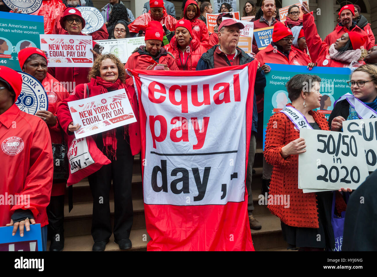 New York, USA. 4th April, 2017. New York, USA. 04th Apr, 2017. Activists, community leaders and politicians gather on the steps of City Hall in New York on Tuesday, April 4, 2017 to rally against pay disparity on the 11th annual Equal Pay Day. Nationwide the gender wage gap is averaged at 20 percent. Legislation set to be voted on tomorrow by the NY City Council would prohibit employers from asking for the wage history of prospective employees, a practice that perpetuates wage inequality. ( © Richard B. Levine) Credit: Richard Levine/Alamy Live News Stock Photo