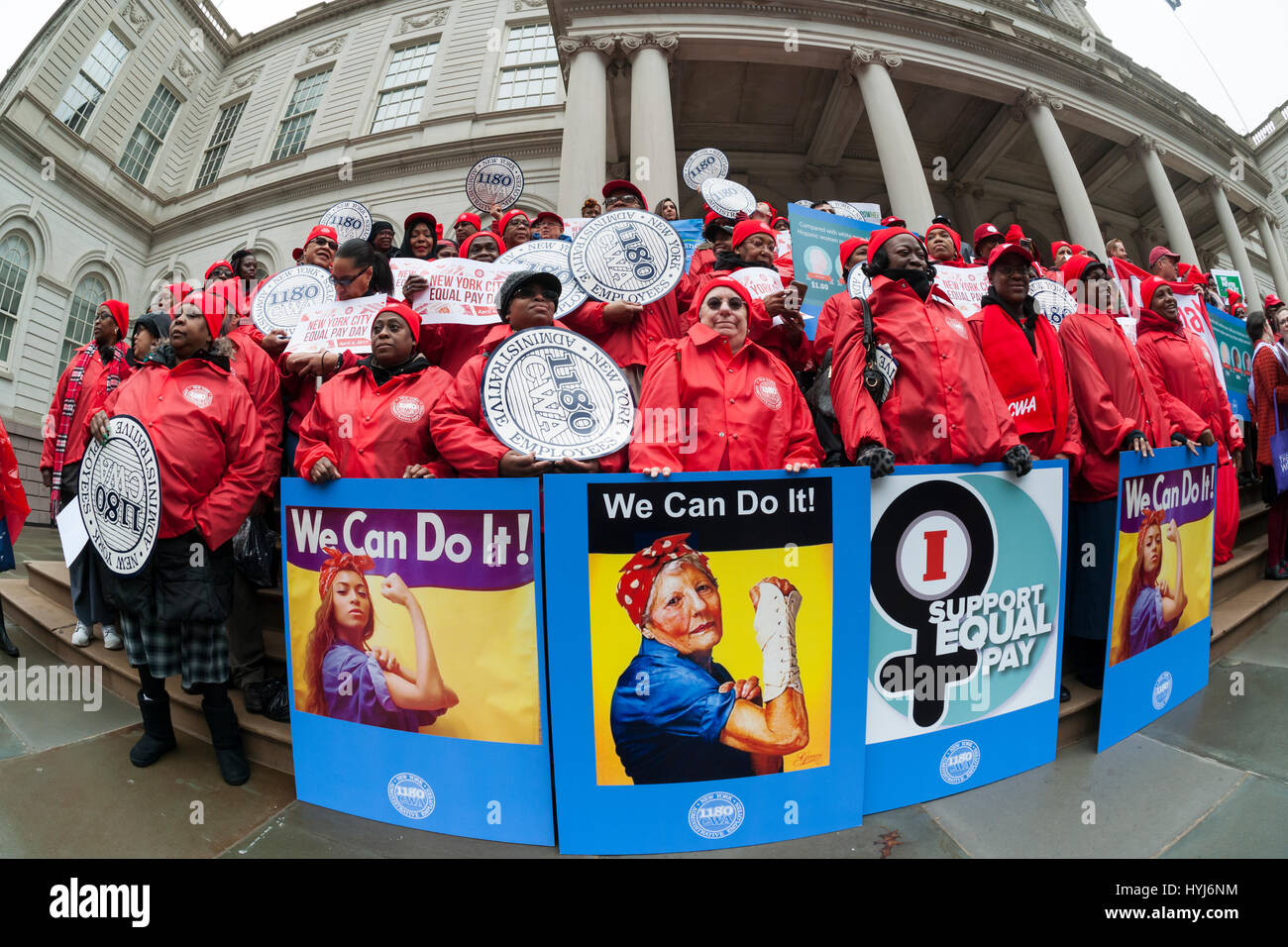 New York, USA. 4th April, 2017. New York, USA. 04th Apr, 2017. Activists, community leaders and politicians gather on the steps of City Hall in New York on Tuesday, April 4, 2017 to rally against pay disparity on the 11th annual Equal Pay Day. Nationwide the gender wage gap is averaged at 20 percent. Legislation set to be voted on tomorrow by the NY City Council would prohibit employers from asking for the wage history of prospective employees, a practice that perpetuates wage inequality. ( © Richard B. Levine) Credit: Richard Levine/Alamy Live News Stock Photo