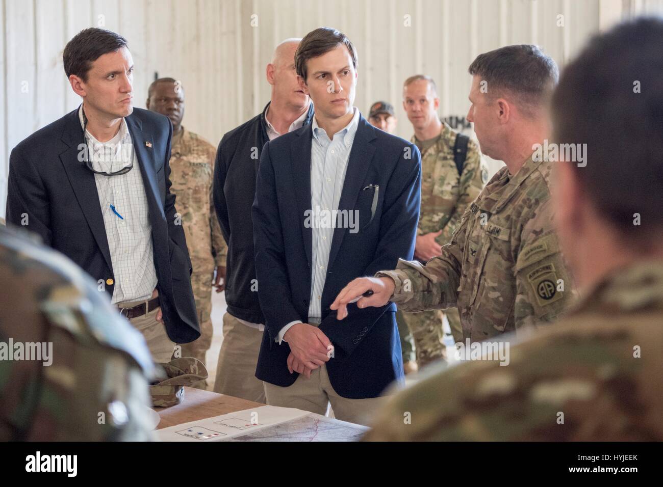 Qayyarah West, Iraq. 4th Apr, 2017. Jared Kushner, Senior Advisor and son-in-law to President Trump, center, and homeland security advisor Tom Bossert, left, receive a briefing from Colonel Patrick Work, commander of the 2nd Brigade, 82nd Airborne Division, during a visit to a forward operating base April 4, 2017 in near Qayyarah West, Iraq. Kushner accompanied Joint Chiefs Chairman Gen. Joseph Dunford in a visit to the front lines in the battle to recapture Mosul from the Islamic State. Credit: Planetpix/Alamy Live News Stock Photo