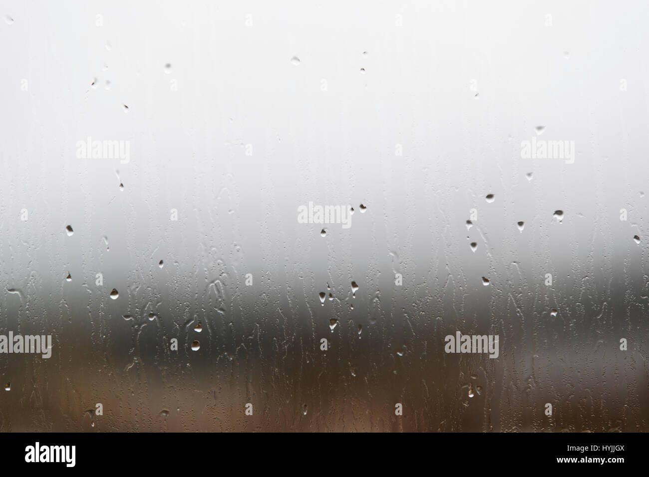 Close-up of raindrops on a window glass Stock Photo
