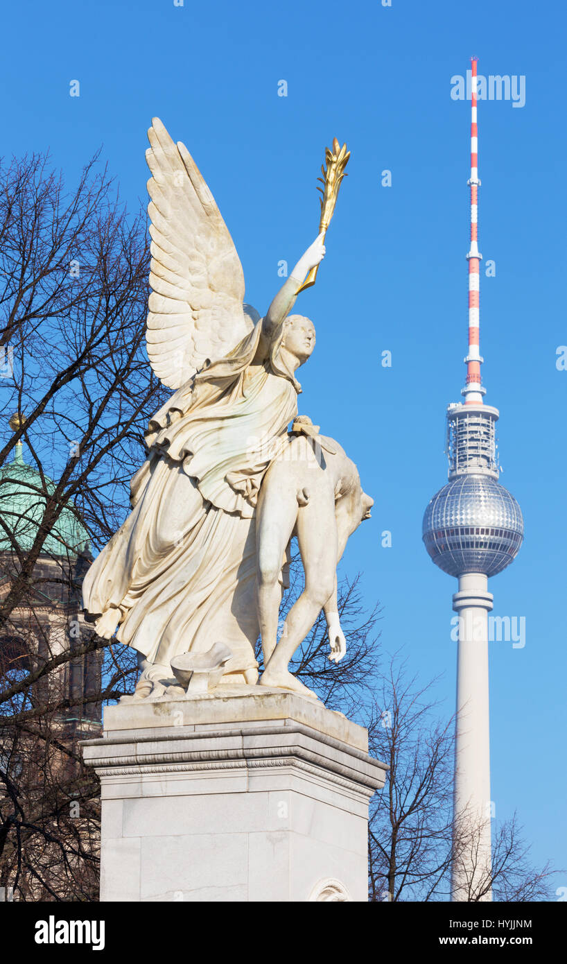 BERLIN, GERMANY, FEBRUARY - 13, 2017: The statue on the Palace Bridge (Schlossbruecke) in Berlin - Nike takes the fallen hero to Olympus Stock Photo