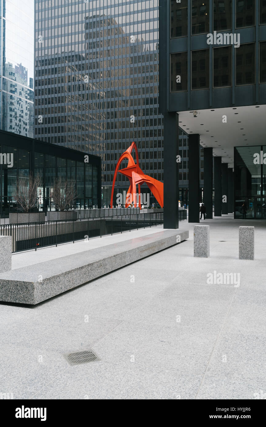 Flamingo, created by noted American artist Alexander Calder, is a 53-foot tall stabile located in the Federal Plaza in front of the Kluczynski Federal Stock Photo