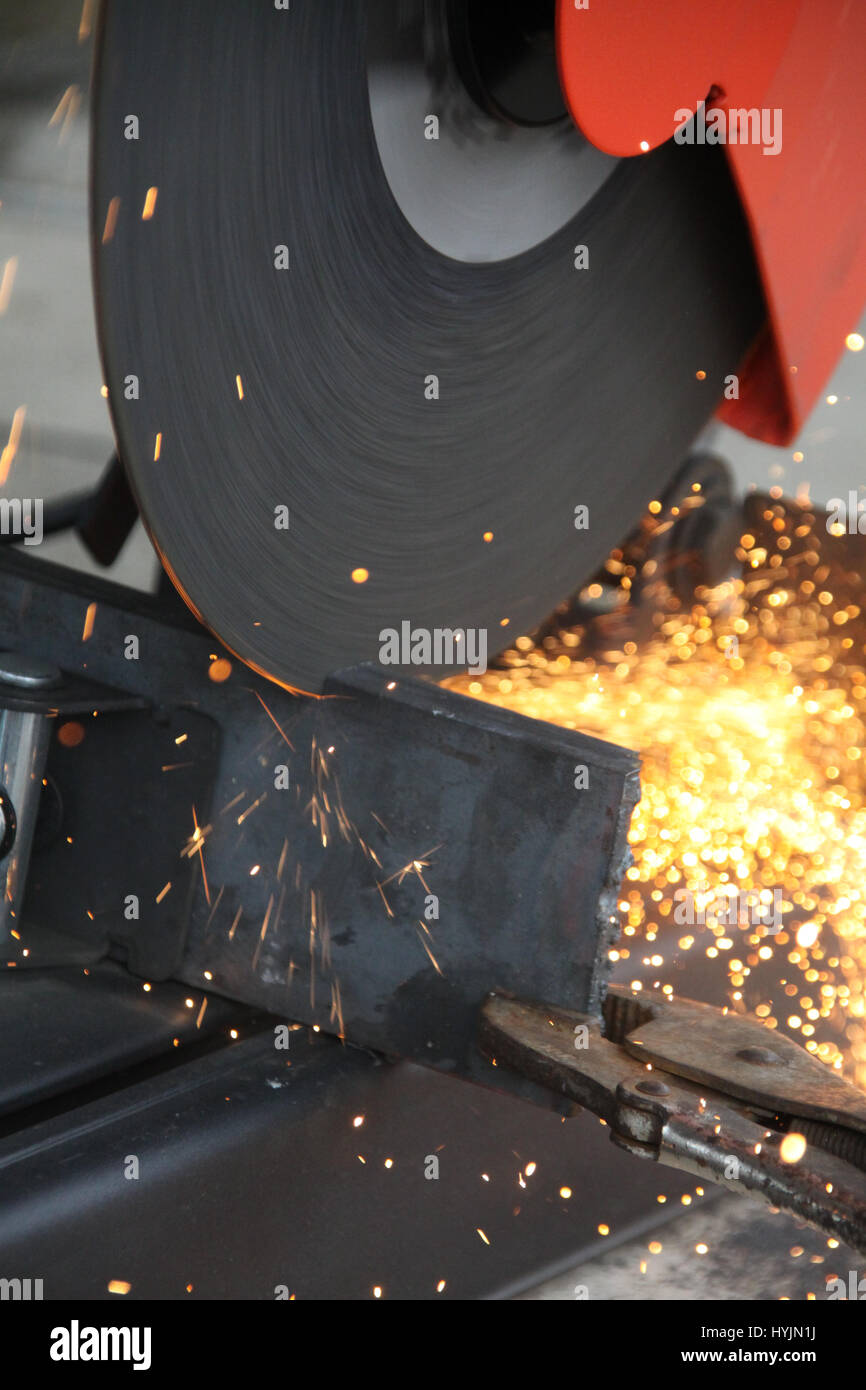 cutting steel with grinder machine close up Stock Photo Alamy