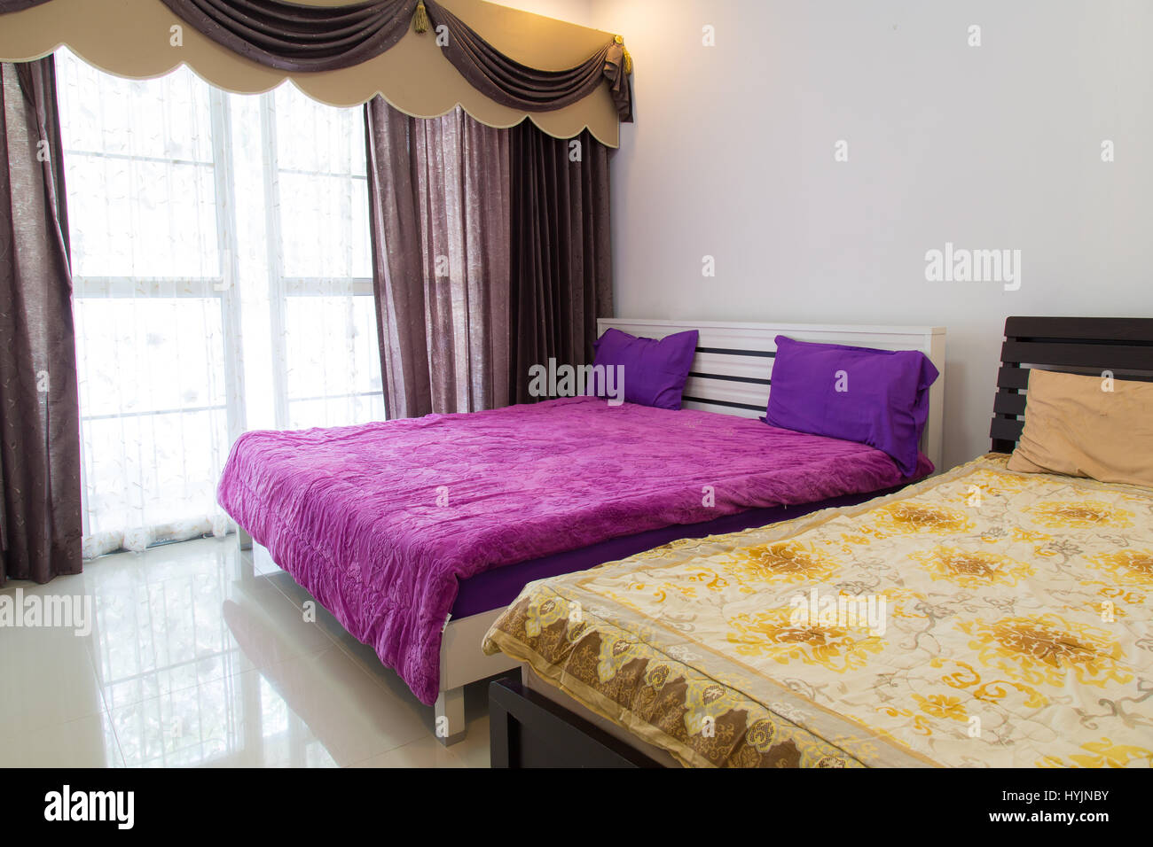 Bed in a hotel room , Thailand Stock Photo Alamy