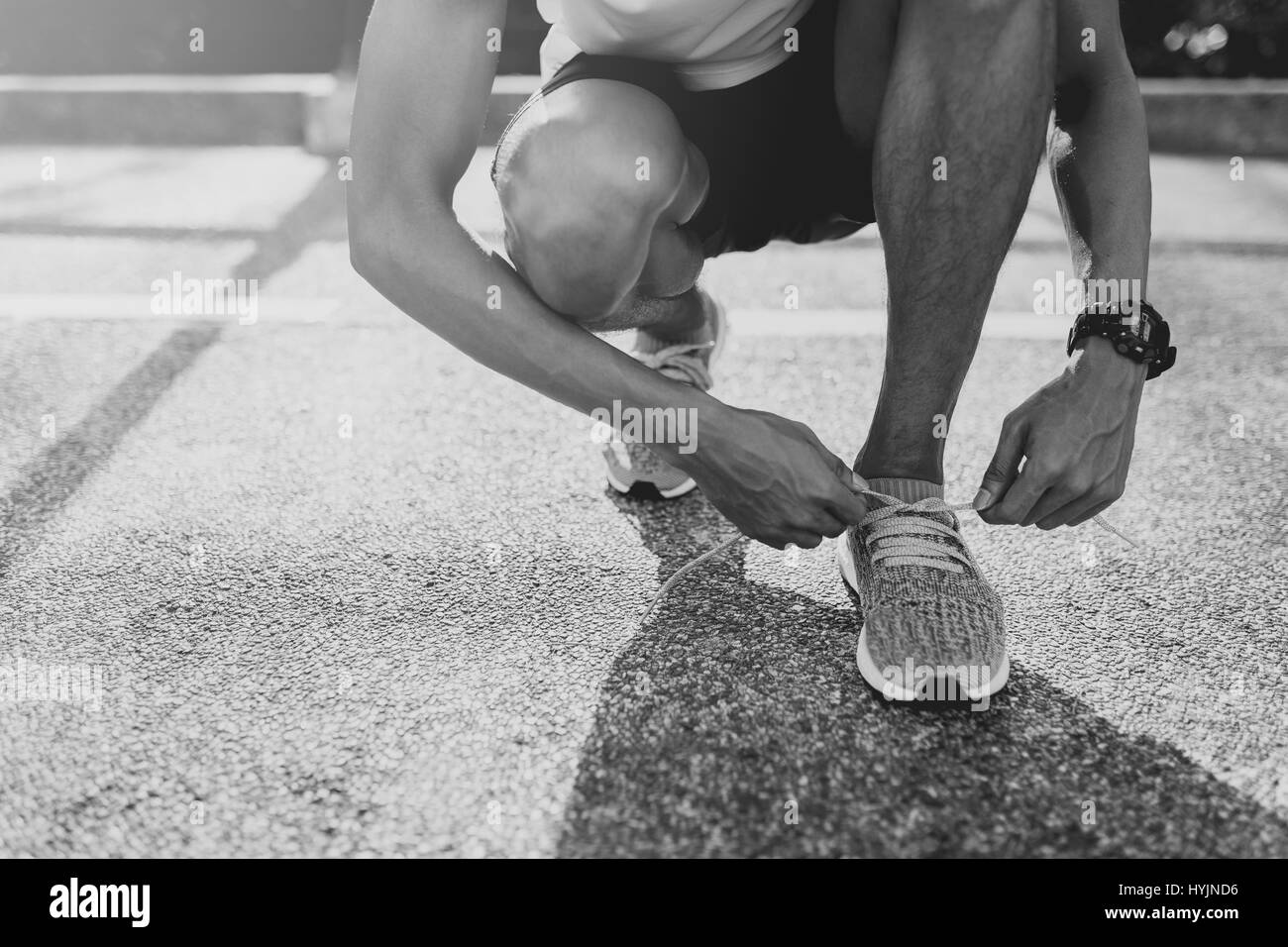 Black and top white track shoes