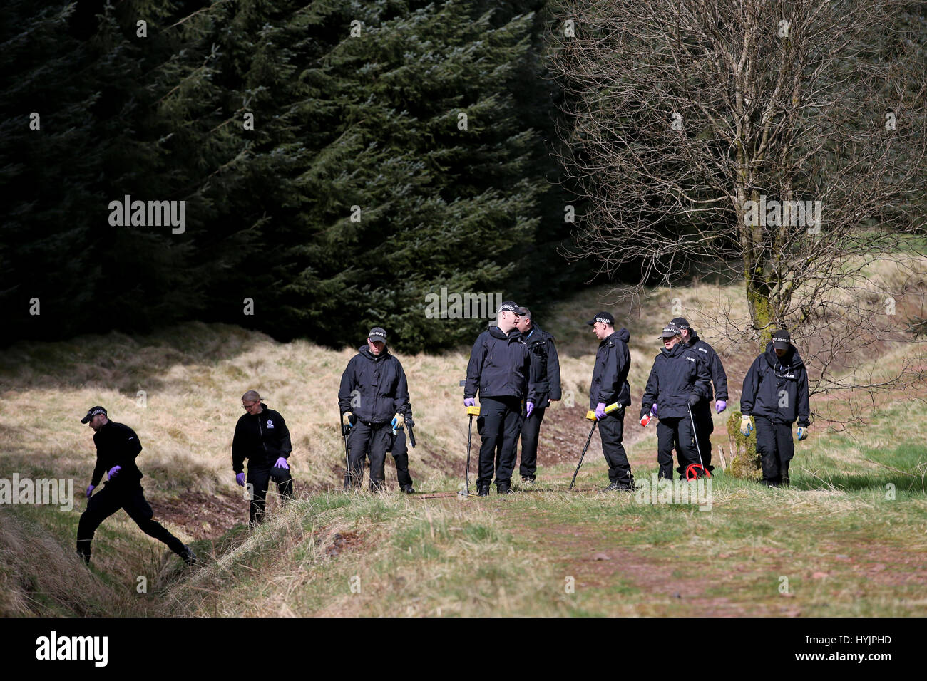 Police search woodland near Roberton in South Lanarkshire after Police Scotland appealed for new information in relation to the disappearance of Emma Caldwell who was found dead in woods near Biggar, South Lanarkshire, in May 2005. Stock Photo