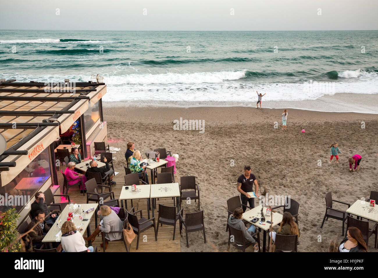 Typical chiringuito. Beach restaurant at sunset, Benalmadena. Malaga province Costa del Sol. Andalusia Southern Spain, Europe Stock Photo