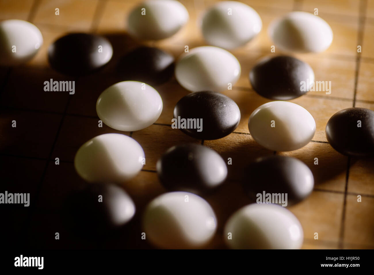Close up shot of a Go board game, with black and white stones Stock ...