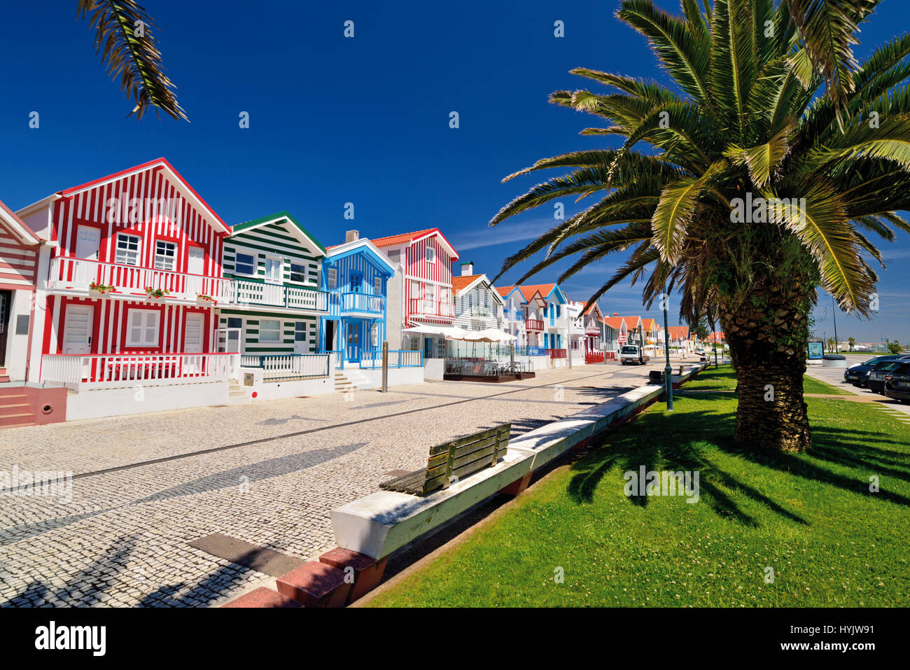 Portugal: Colorful holiday cottages in coastal village Costa Nova Stock Photo