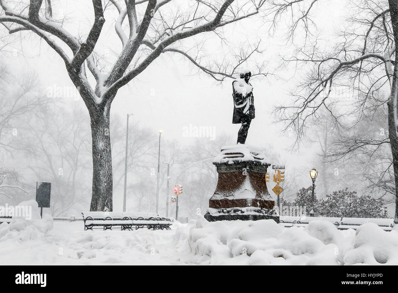 Statue of William Shakespeare in Central Park during a heavy snowfall