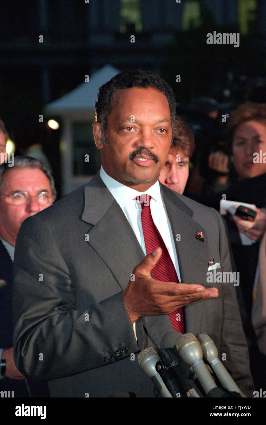 Rev. Jesse Jackson talks to the media after meeting with President Bill
