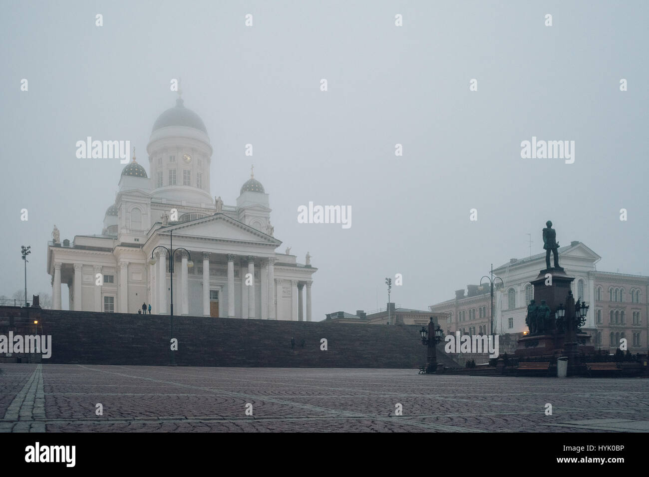 Helsinki Cathedral and statue of emperor Alexander II by foggy day, Finland Stock Photo