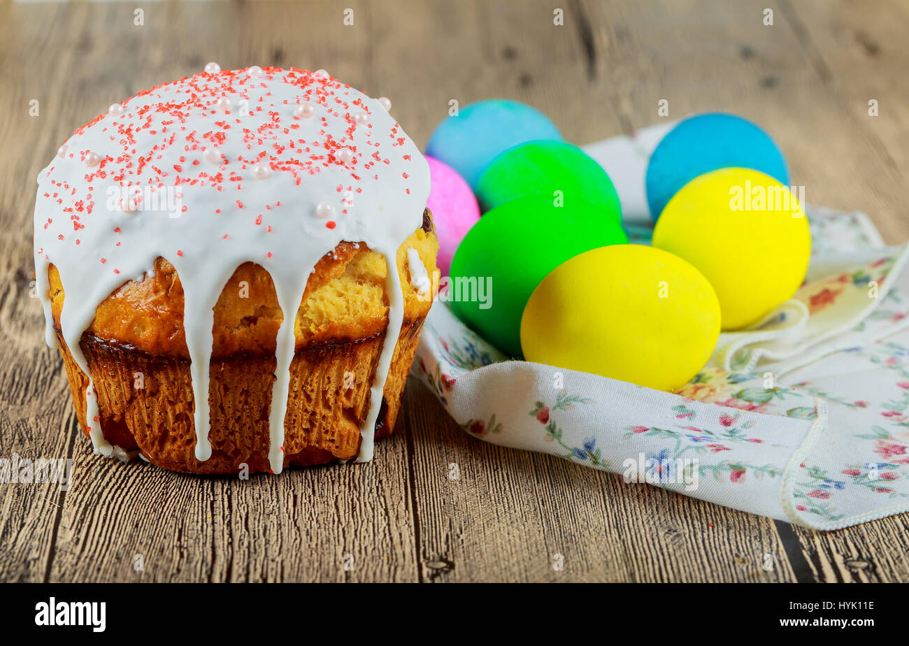 Baking home made Easter bread with organic Easter cake and colored eggseggs. Stock Photo