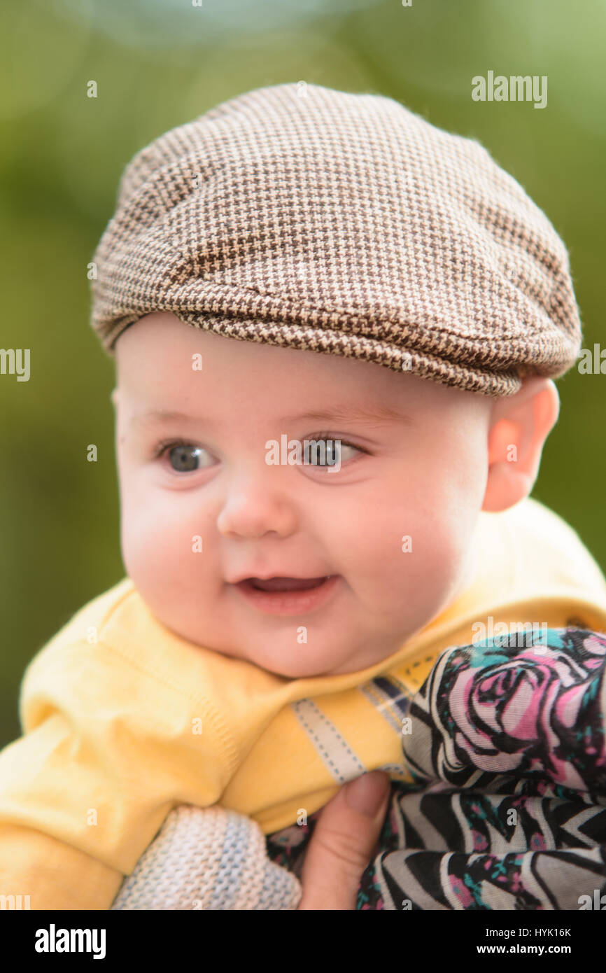 Baby boy wearing tweed cap hi res stock photography and images Alamy