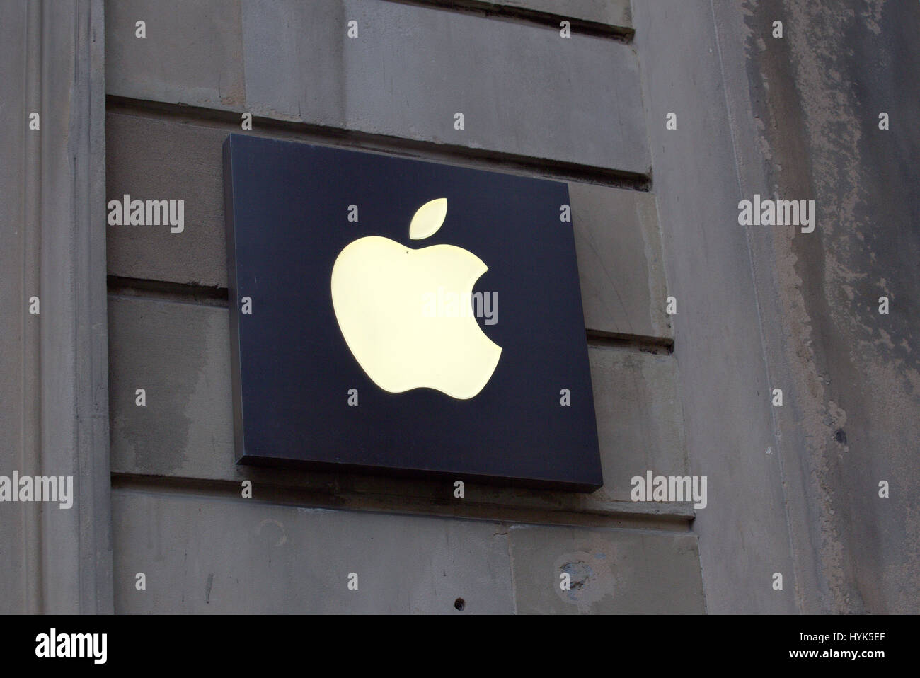 Apple logo on sandstone building Glasgow Stock Photo