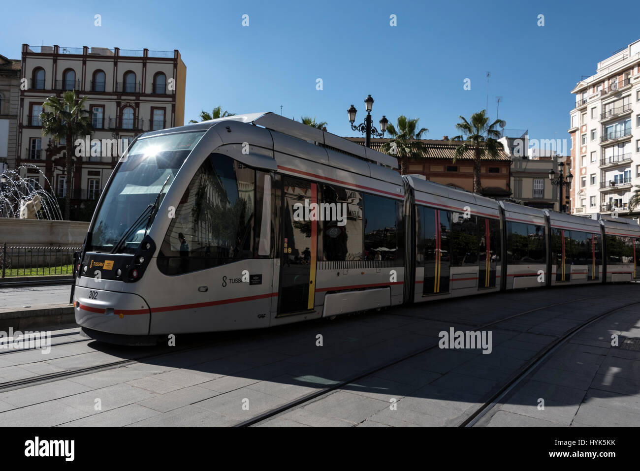 A new tram system in service  on Avenida de la Constitucion (Constitution Avenue)  Seville, Spain Stock Photo