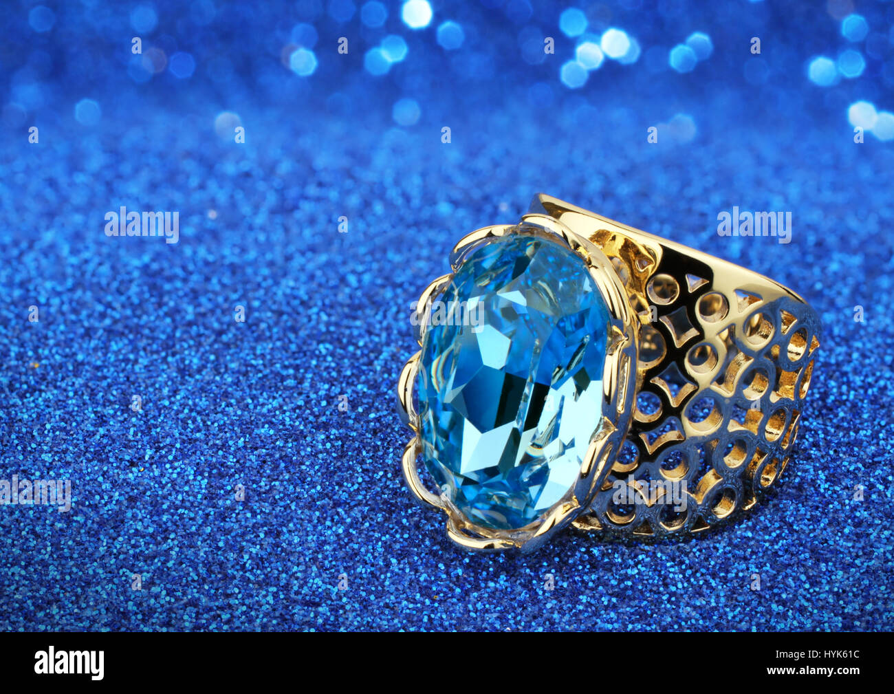 Jewelery ring with aquamarine on blue background Stock Photo