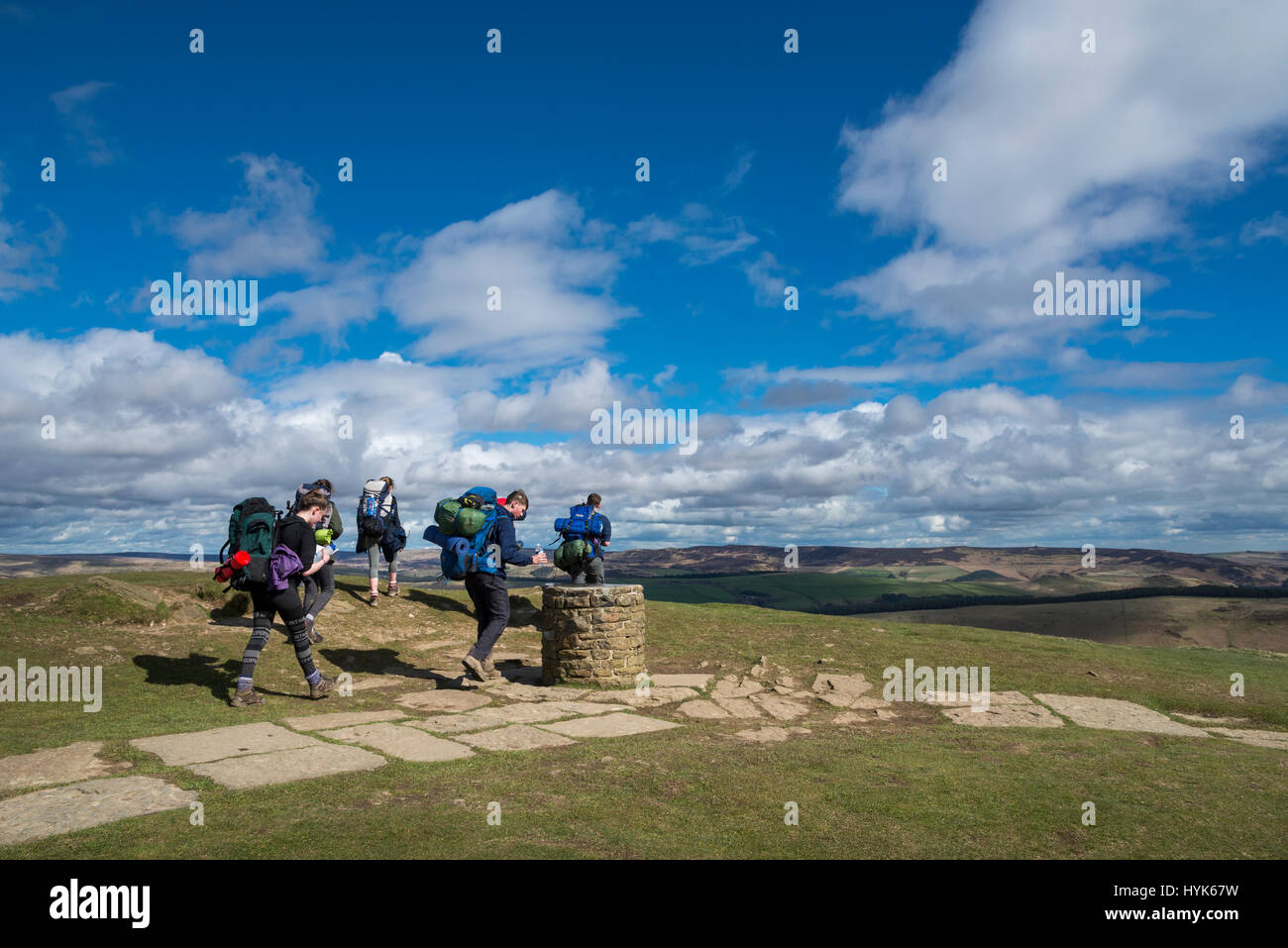 Group of young hill walkers on the summit of Lose Hill in the Peak District national park, England Stock Photo