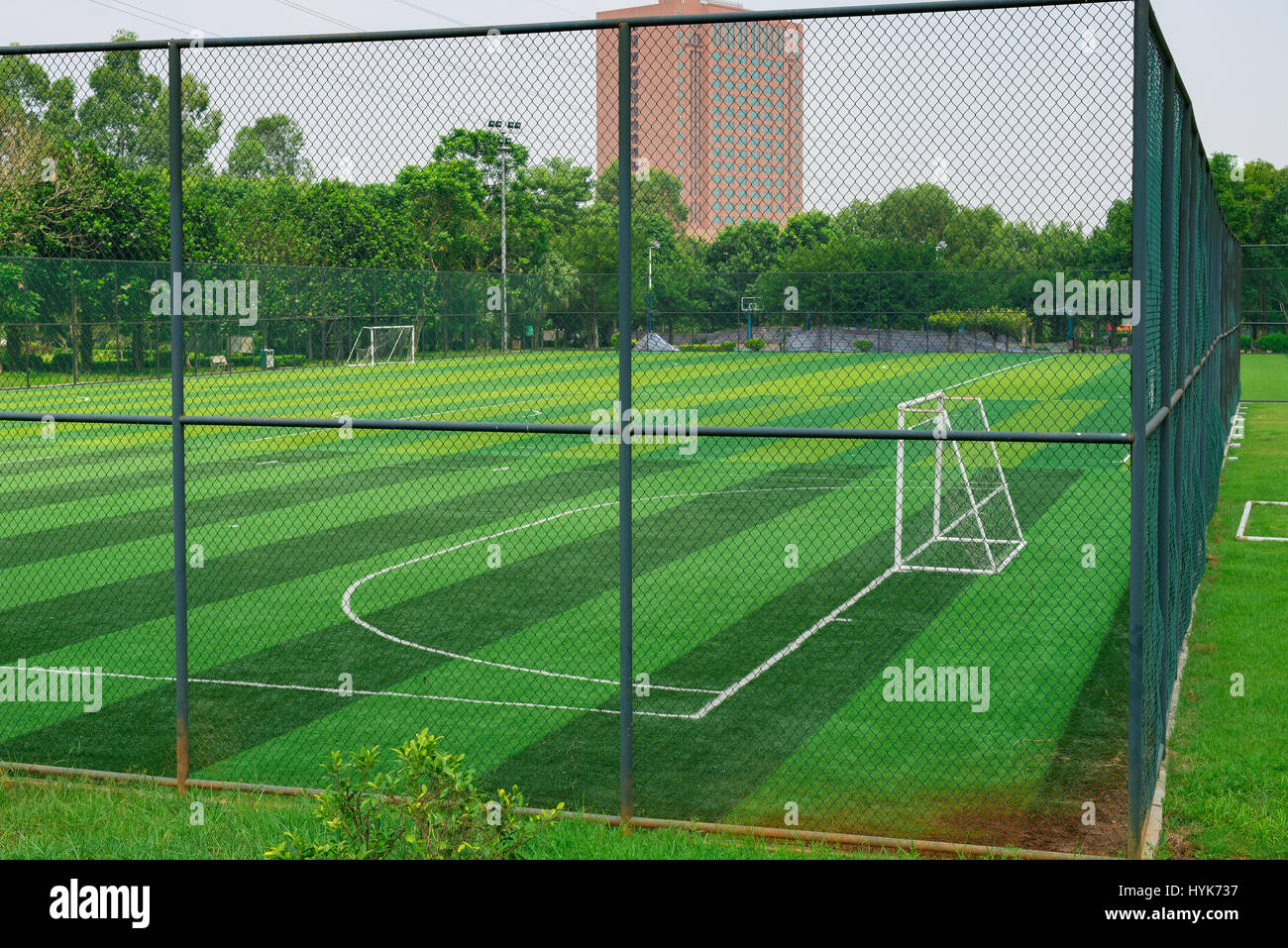 a soccer field behind the fence Stock Photo Alamy