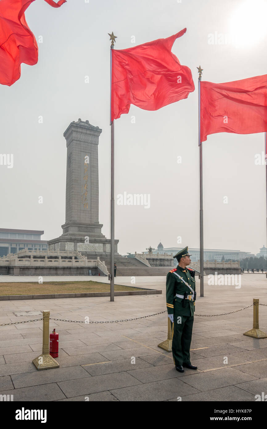 Monument to the People's Heroes with fire extinguishers in case people protest by setting fire to themselves, Tiananmen Square, Beijing, China Stock Photo