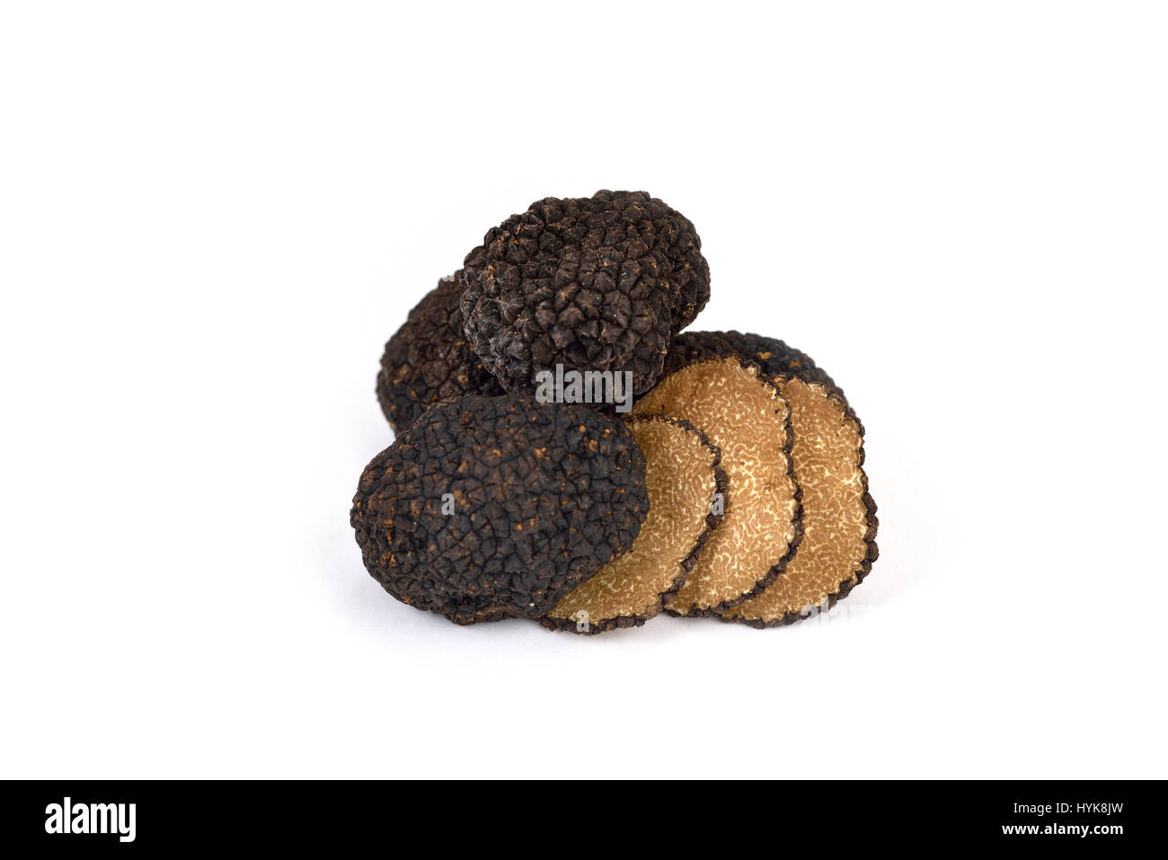 Black burgundy truffles on white background Stock Photo