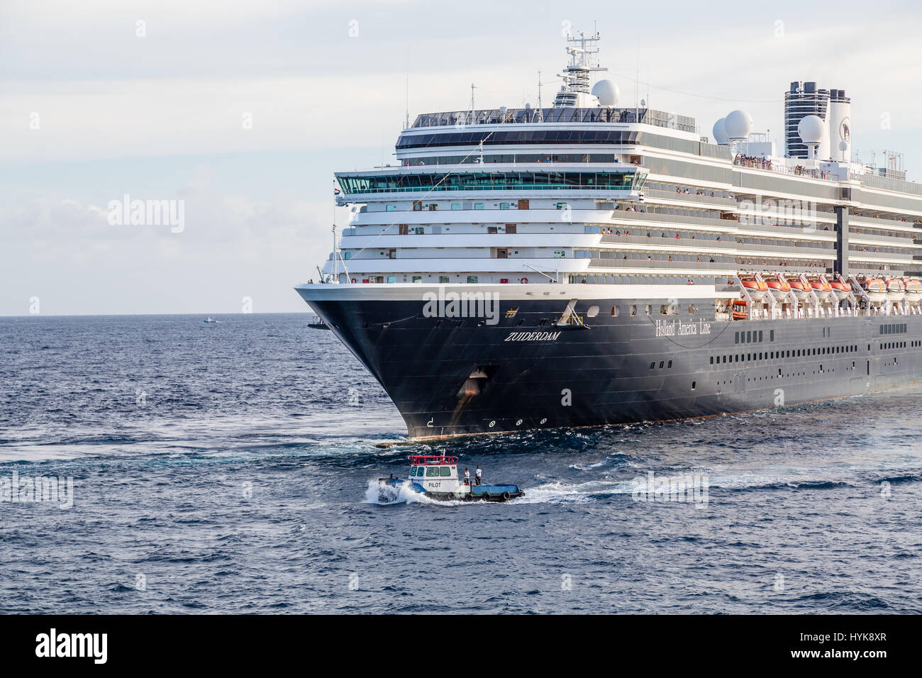 Huge black and white luxury cruise ship sailiing off Stock Photo - Alamy