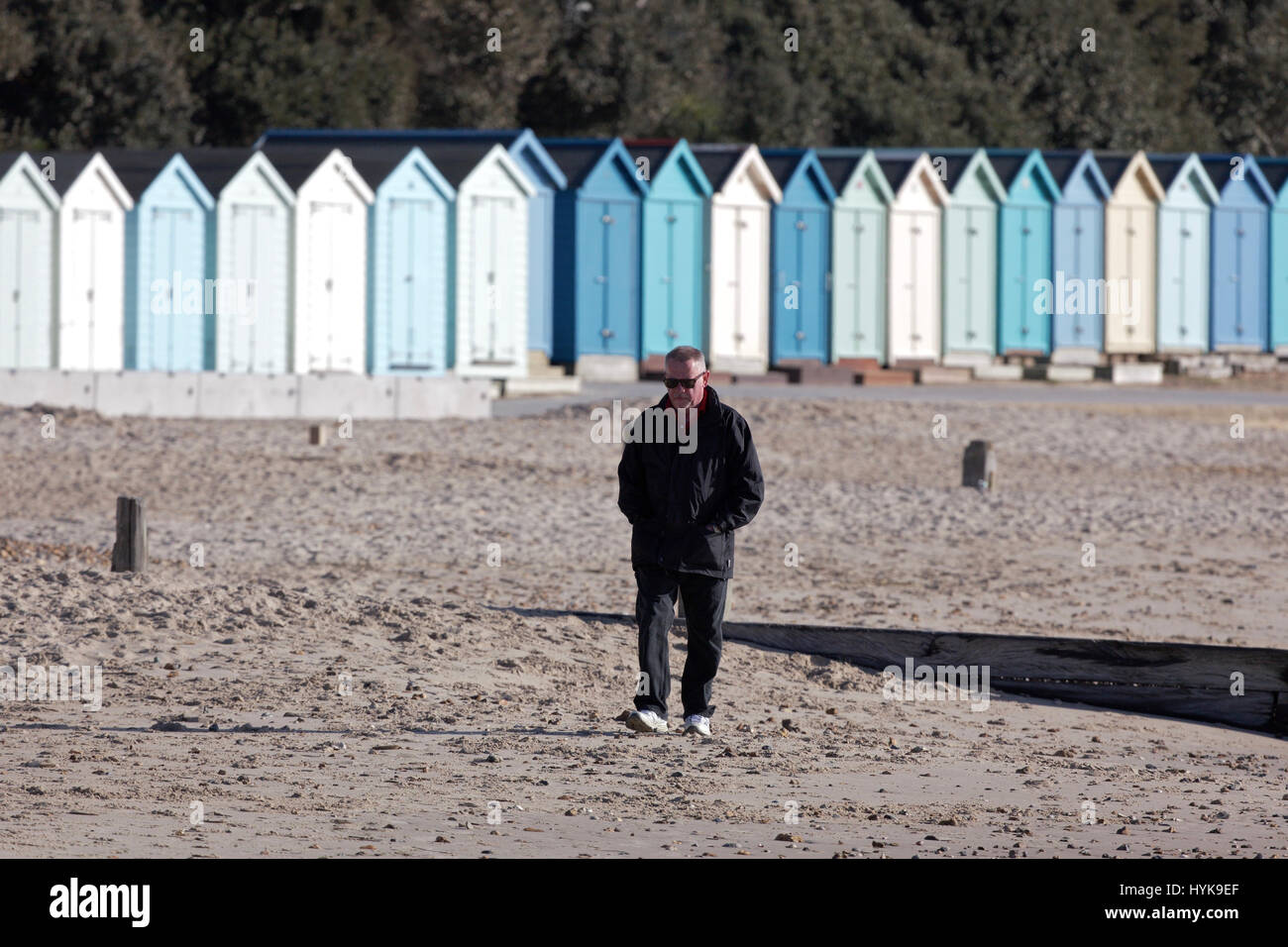 Man walking along the beach hi-res stock photography and images - Alamy