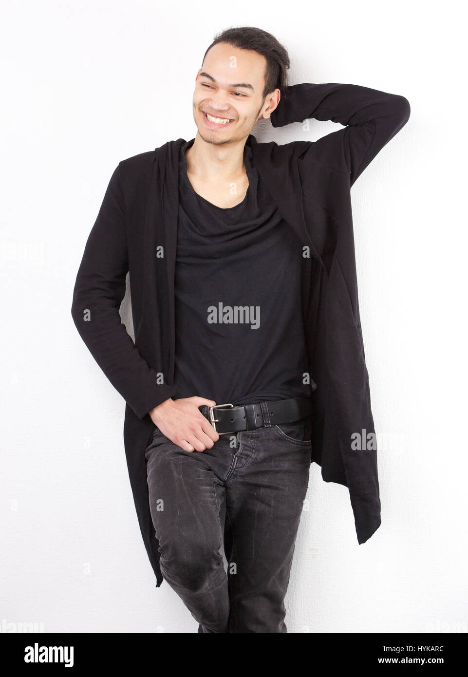 Portrait of a happy young man smiling against white background Stock ...