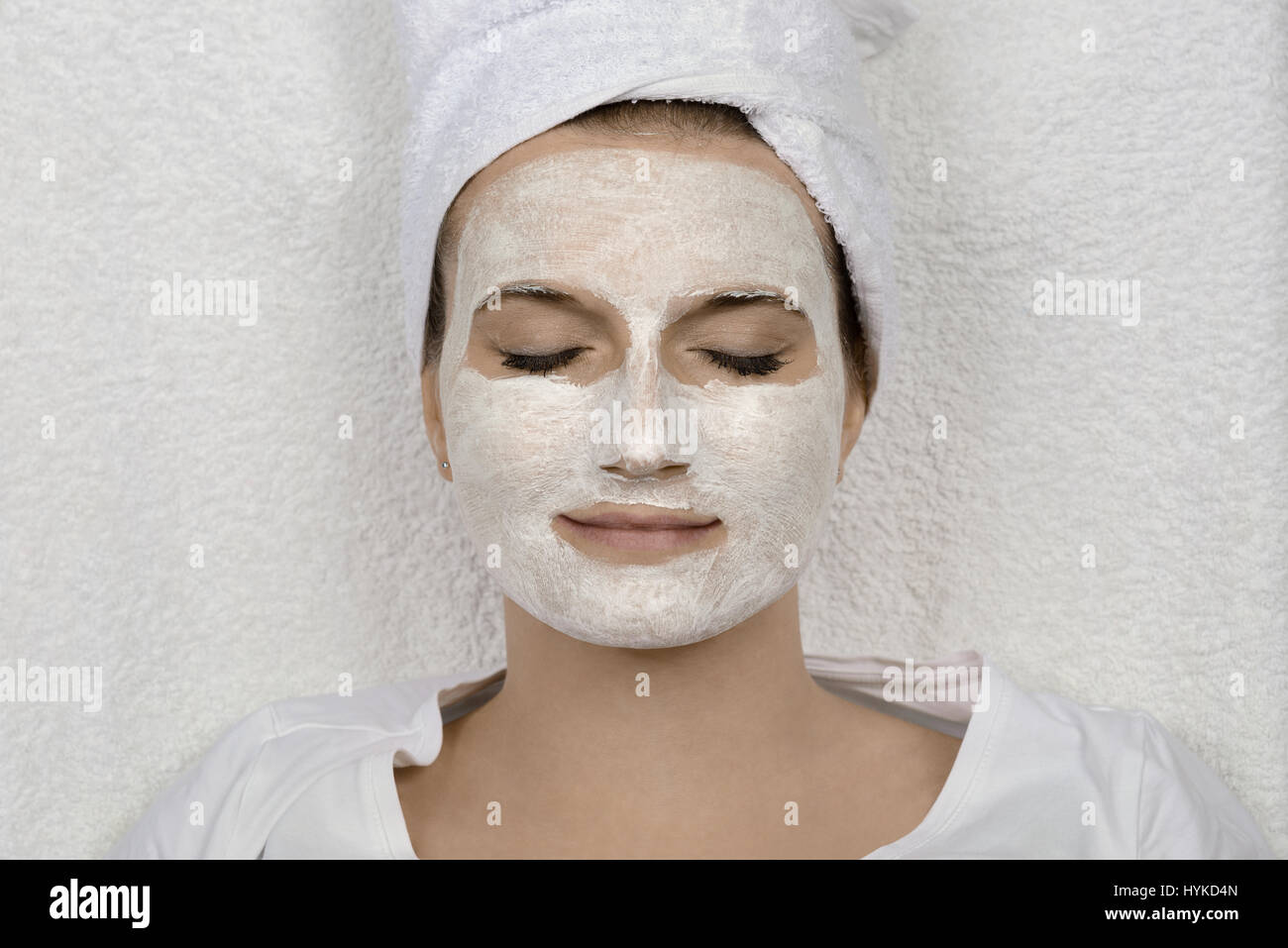 Woman relaxing with beauty face mask Stock Photo Alamy